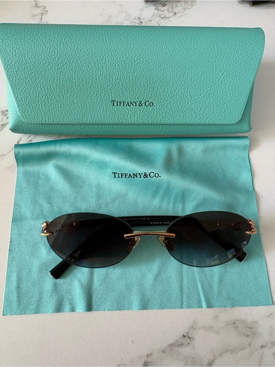 Tiffany & Co. TF3104D Women\'s Black Oval Rimless Sunglasses with Gold Accents main image 4